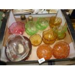 A carnival glass dish, amber coloured fruit bowls, cranberry dish, two glass sugar shakers, etc.
