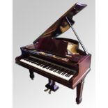 A good Mahogany and Walnut cased 6 1/2 octave Boudoir Piano by Marshall & Rose of London,