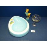 A box of Babycham to include; melamine dish, deer/fawn bottle top and a Babycham glass.