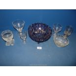 A small quantity of Rummer and wine glasses and a purple fruit bowl.