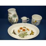 Four pieces of Portmeirion 'Botanical Gardens' including; vase, cream jug, storage pot, etc.