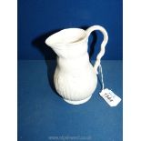 A Parianware jug marked d36,