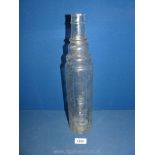 A vintage Essolube 1 quart clear glass bottle.