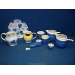 A quantity of Devonshire blue & white pottery to include; two jugs, sugar bowl, cup,