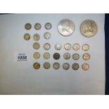 Twenty-four Edward VII and Victoria threepence pieces in various states of wear,