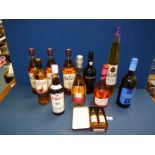 10 bottles of alcohol including Galliano, Bell's whiskey, The Famous Grouse, Pimm's,
