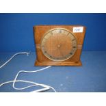 A wooden Smiths Sectric square shape mantle clock with Roman numerals, 8" tall x 9" wide.