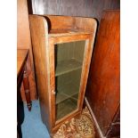 An unusual 1920's/30's narrow Oak glazed-doored cabinet, the sides with reeded moulding,