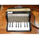 A child's vintage Hohner Mignon accordion, working.