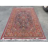A Persian rug. 9' x 6'.