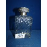 A large perfume Bottle with silver top; Birmingham maker mark 'CM' (possibly C.