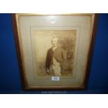 A wooden framed three quarter portrait of a gentleman in hunting dress. 13 3/4" x 16".