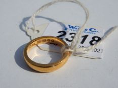 A 22 carat gold wedding band, inside diameter 16.5 mm, 6 gms approx.