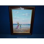 A framed Oil on canvas depicting a seascape with figures on the beach, signed P. Watkins.