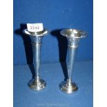 A pair of Birmingham silver posy vases, maker AL date mark U possibly 1994.