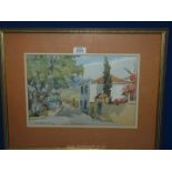 A framed and mounted watercolour of ladies in conversation over a garden wall (possibly Portugal),