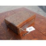 A nicely carved dark-wood trinket/jewellery box having a lift-out inner tray,