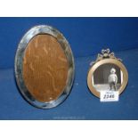 A Birmingham silver oval picture frame, some wear and damage to back, possibly 1928, W.
