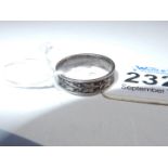 A ring marked "Silver" decorated with trailing Ivy in relief, inside diameter 17.5 mm approx.