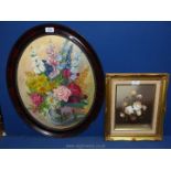 A vintage oval Oil painting of flowers in vase together with a smaller floral still life, signed S.