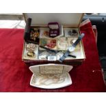 A cardboard jewellery box containing; faux pearl necklaces, amethyst and gold plated cufflinks,