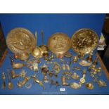 A quantity of brass to include bells, spoons, goblet, soap dish etc.