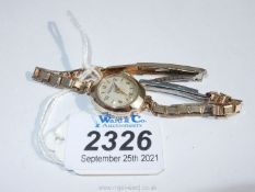 A "Rotary" lady's 9 carat gold cased wristwatch having a rolled gold wristlet,