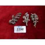 Three marcasite silver flower brooches.