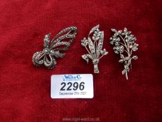 Three marcasite silver flower brooches.