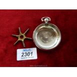 A London silver fob watch case, possibly 1946 and a key winding star.