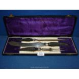 A boxed silver horn handled carving set by Harrison & Fish of Sheffield 1909.