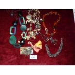 A quantity of Costume Jewellery including beads, bracelet etc.