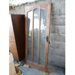 Three pane glazed external door 32 3/4'' x 77 3/4''.