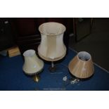 Three table lamps and shades.