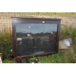 A glazed fronted notice board with key 43 1/2" x 34 1/2" x 4".