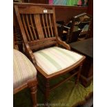 An elegant Edwardian Mahogany sloping back side Chair with marquetry decoration and standing on