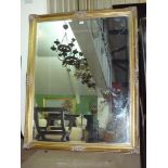 A gilded effect finish rectangular bevelled wall Mirror, 51" x 41" approx.