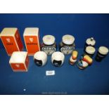 A quantity of Guinness condiment sets including two rugby ball egg cups, two Guinness Marmite jars,