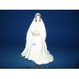 A Royal Worcester 2007 'Her Majesty Queen Elizabeth II, Diamond Wedding Anniversary' figure.