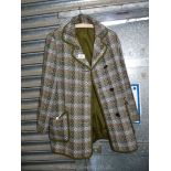 A lady's Welsh Wool Jacket, size M/L in shades of green, fawn, orange and grey.