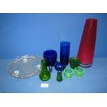 A small quantity of coloured glass to include; tall red vase by Dartington, two blue water glasses,