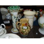 A tall Aynsley cream vase, a Holland hand painted vase and an Indian tree jug by H. J. Wood.