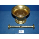 A heavy brass Pestle and Mortar, 4 1/4'' tall.