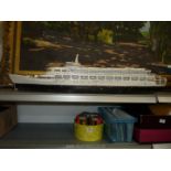 A wooden model of the S.S Canberra.