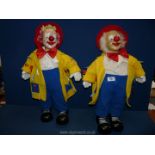 Two Leonardo Collection Clown dolls with china head and hands,