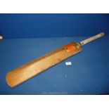 A Wisden cricket bat.