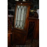 A concave fronted contemporary Corner Cabinet over cupboard in Mahogany and Walnut,