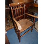 An unusual and elegant mixed hardwoods wide solid seated, open armed elbow Chair,