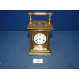 A heavy, brass and bevelled glass cased Carriage Clock of excellent quality by S.J.