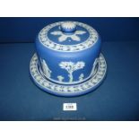 A Wedgwood Jasperware cheese dome, small chip to dome.